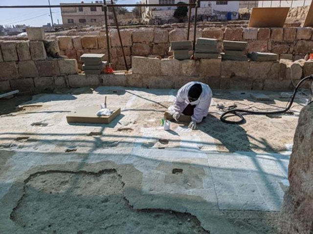 One of UNESCO workers is seen preserving mosaic floors from the Byzantine era, approximately 6th century AD in Rihab, Mafraq (Photo courtesy of UNESCO)
